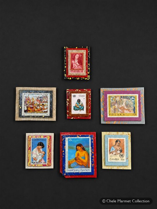 Seven mounted stamps arranged on a dark background.