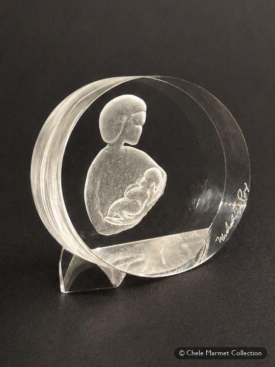 Clear Lucite paperweight with an etched mother-and-baby profile.